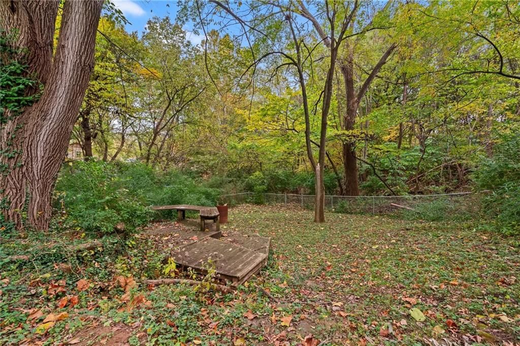 9705 NW Hampton Woods Drive — photo 27