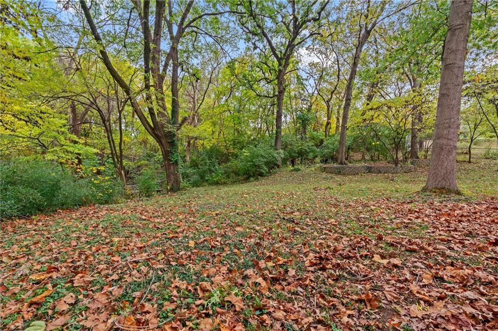 9705 NW Hampton Woods Drive — photo 28