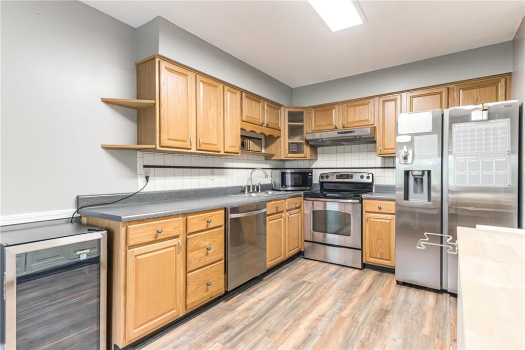 6968 NW Chapel Woods Lane — photo 3
