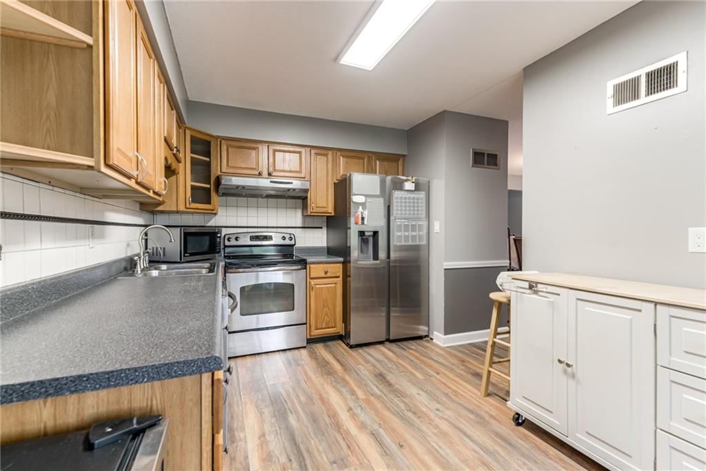 6968 NW Chapel Woods Lane — photo 11