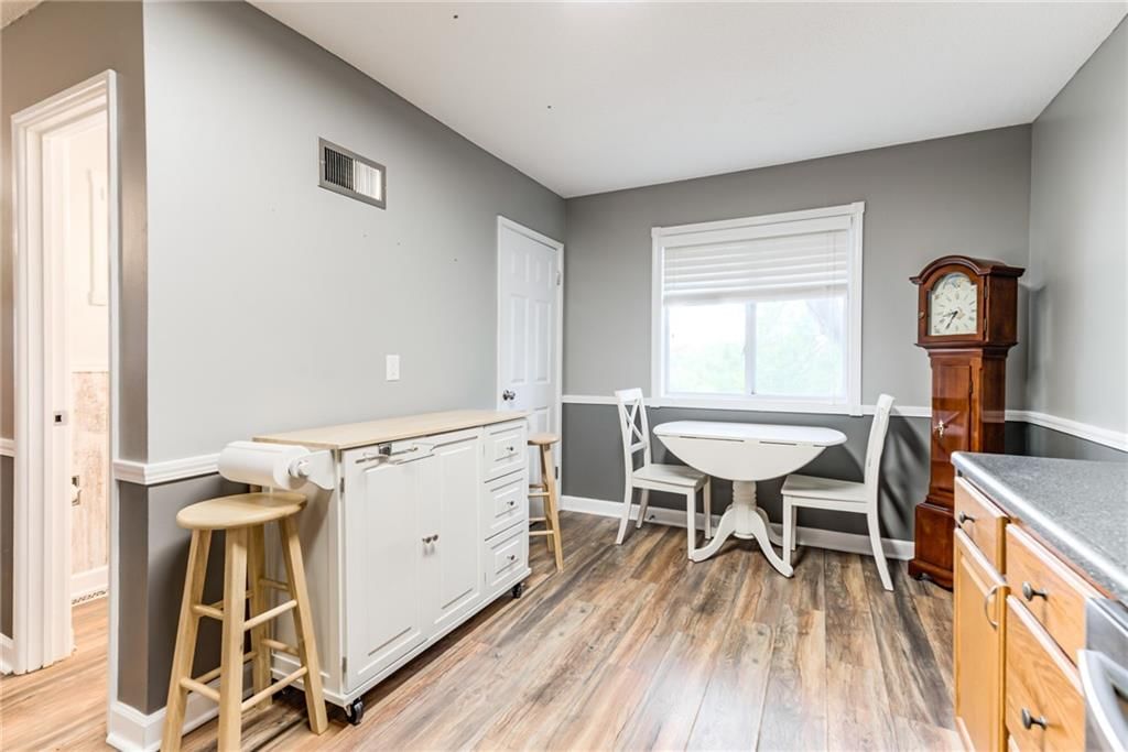 6968 NW Chapel Woods Lane — photo 12