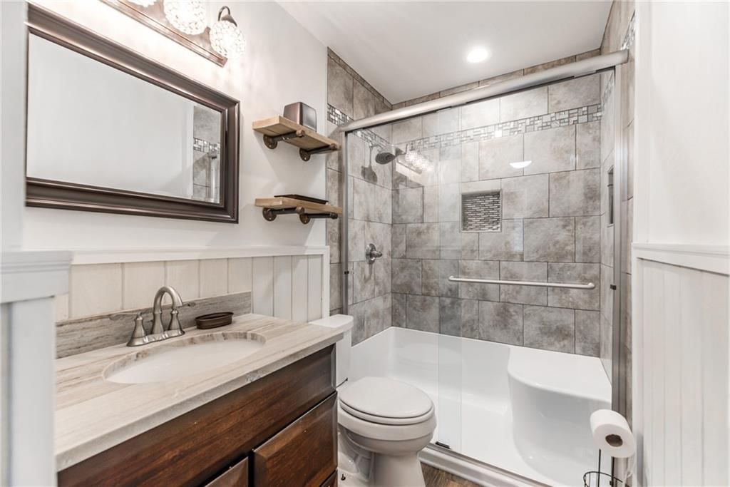 6968 NW Chapel Woods Lane — photo 18