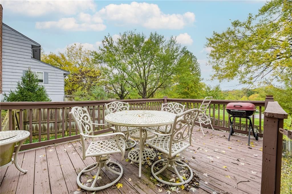 6968 NW Chapel Woods Lane — photo 28