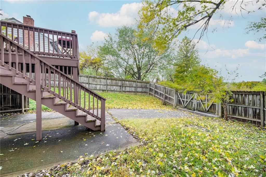 6968 NW Chapel Woods Lane — photo 31