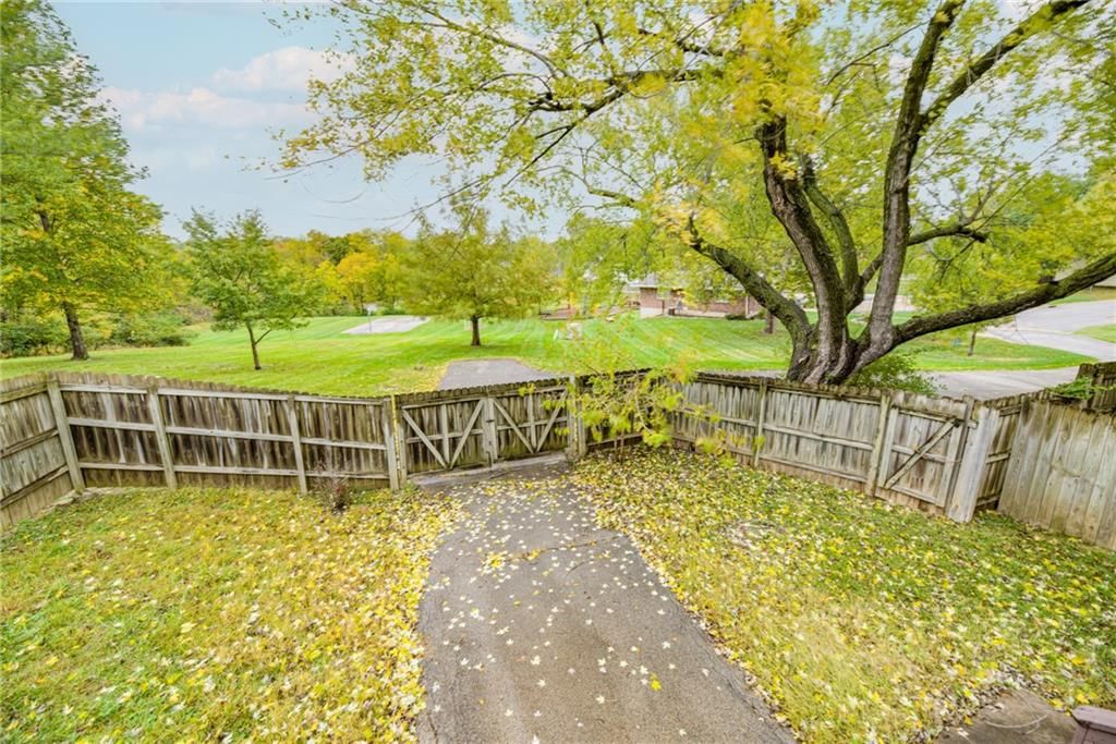 6968 NW Chapel Woods Lane — photo 32