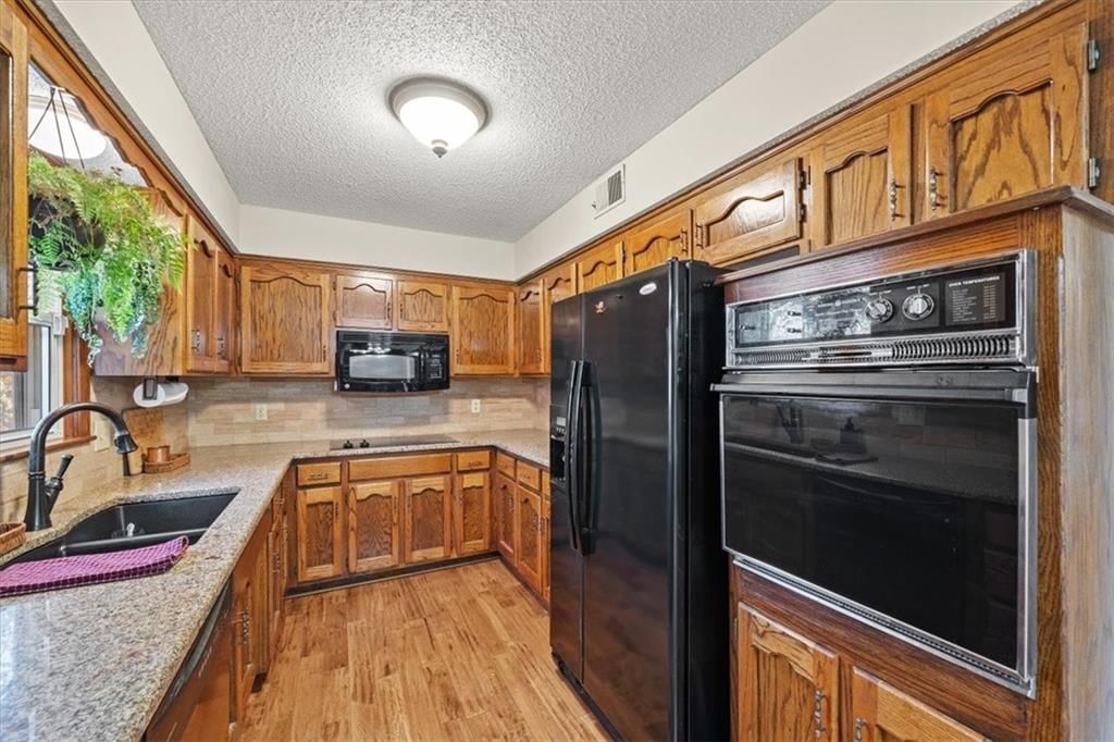 6532 NW Melody Court — photo 16