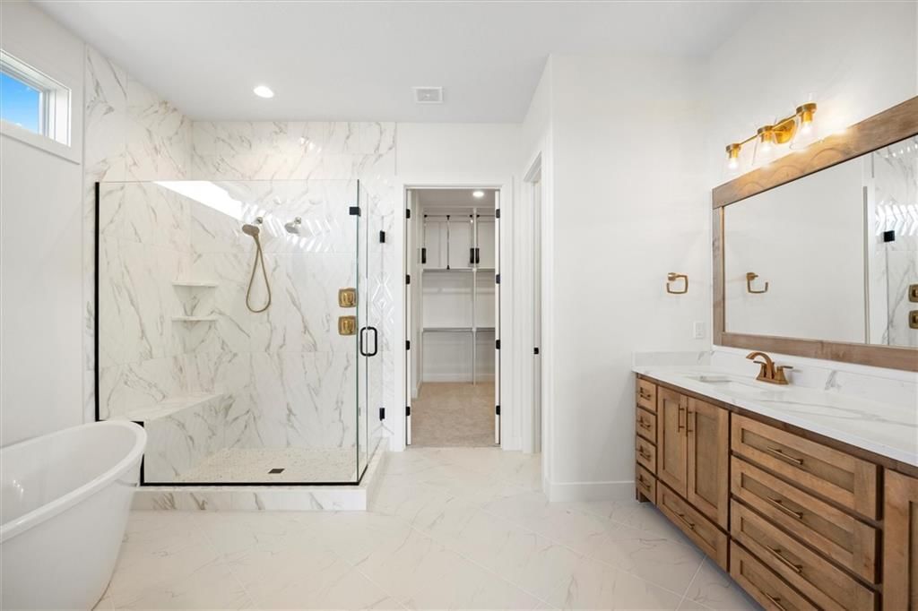 Walk-in shower, freestanding tub and tiled shower at 17028 Rosehill Street, Overland Park, KS 66221