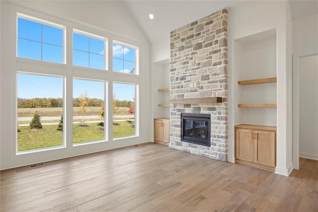 Fireplace, stone fireplace and two-story fireplace at 17028 Rosehill Street, Overland Park, KS 66221