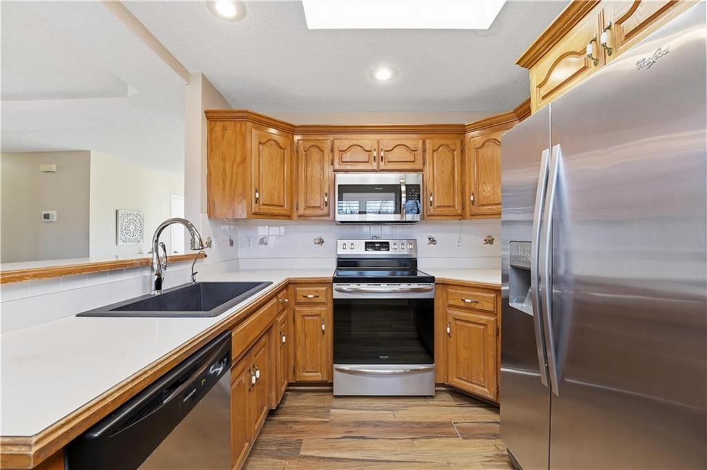 6414 NW REVERE Drive — photo 10