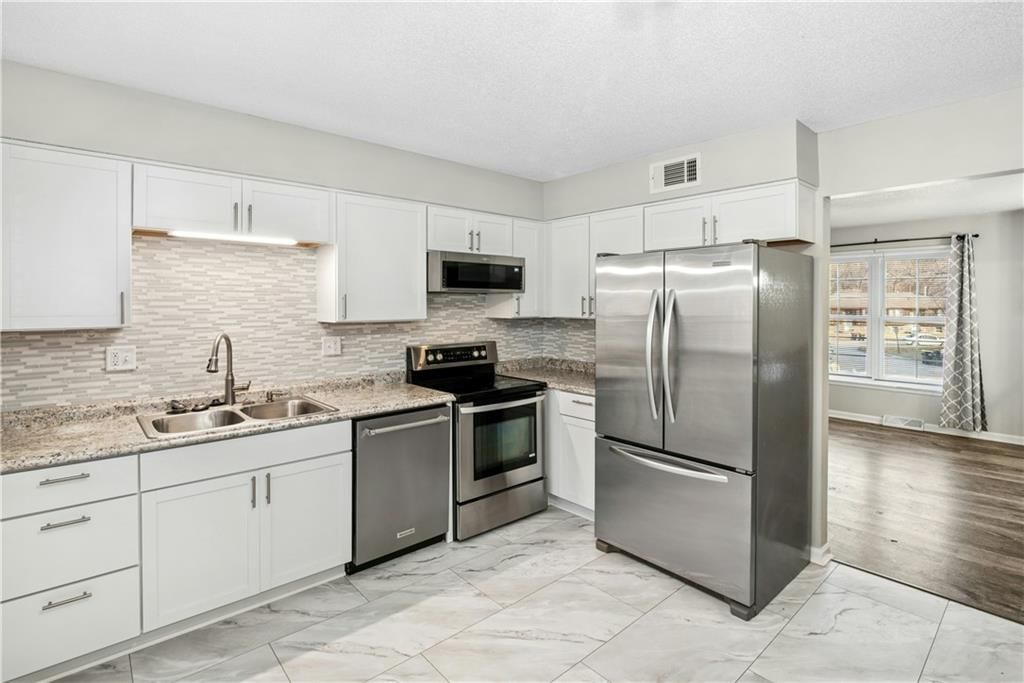 5822 NW Walnut Court — photo 9