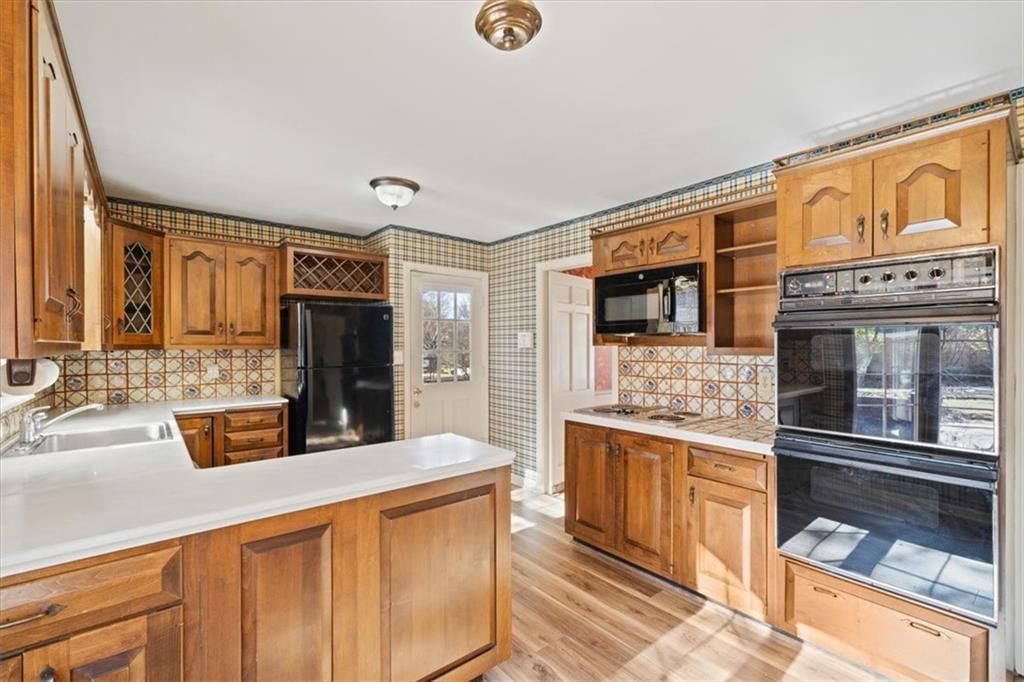 1219 W 67 Terrace — photo 11