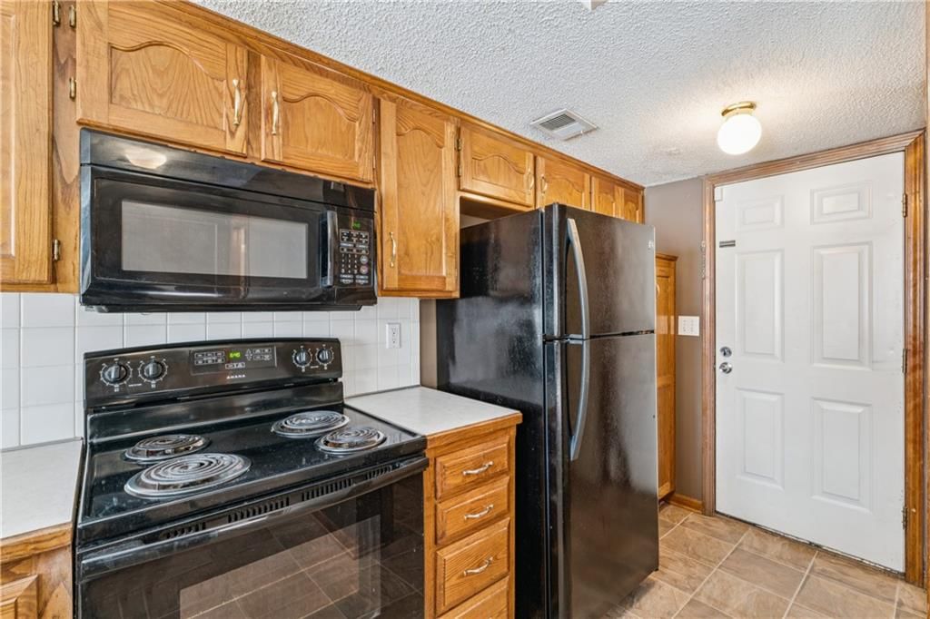 703 NE Swann Circle — photo 12