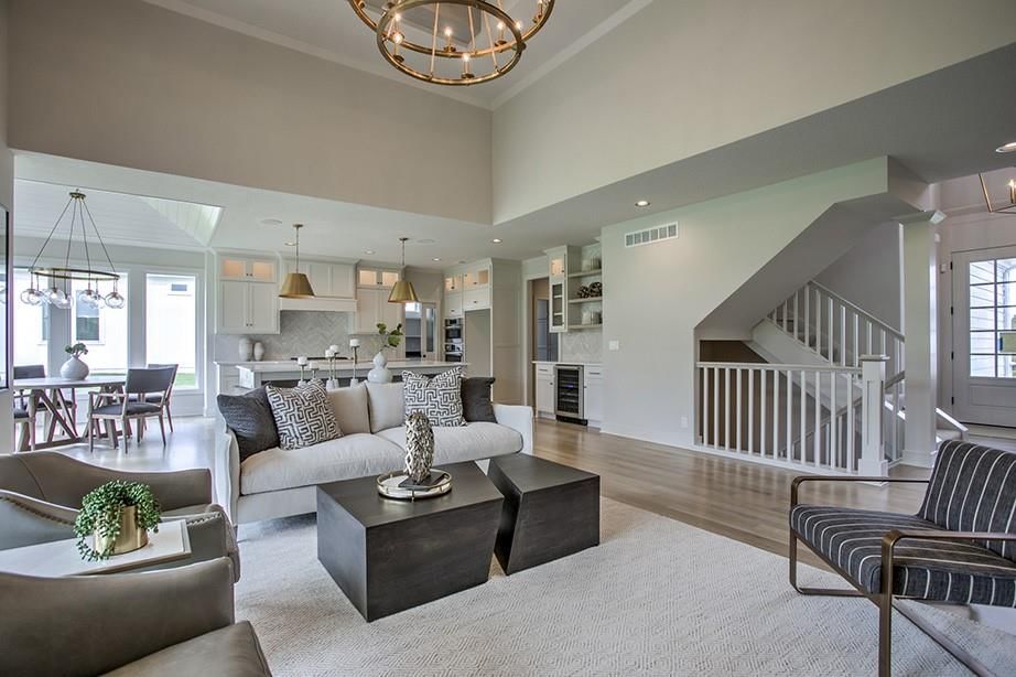 Open floor plan, staircase and wood stair railing at 17025 Parkhill Street, Overland Park, KS 66221