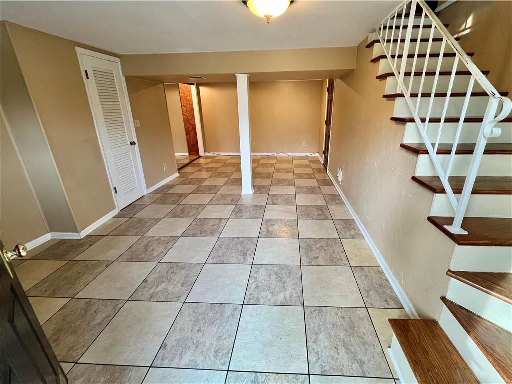 7714 James A Reed Road — photo 2