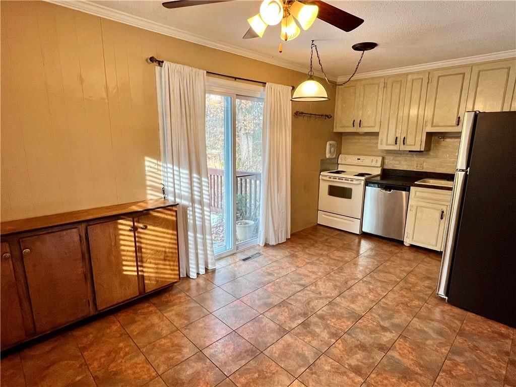 7714 James A Reed Road — photo 8