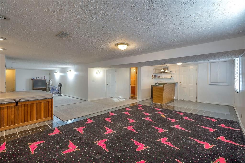 6509 NW Twin Oaks Drive — photo 16