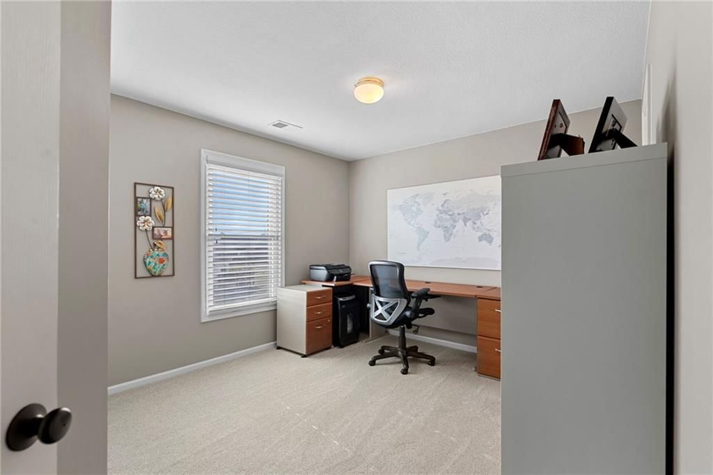 7715 W 144 Terrace — photo 35