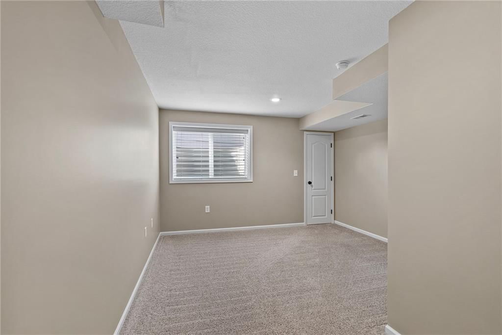 7715 W 144 Terrace — photo 46