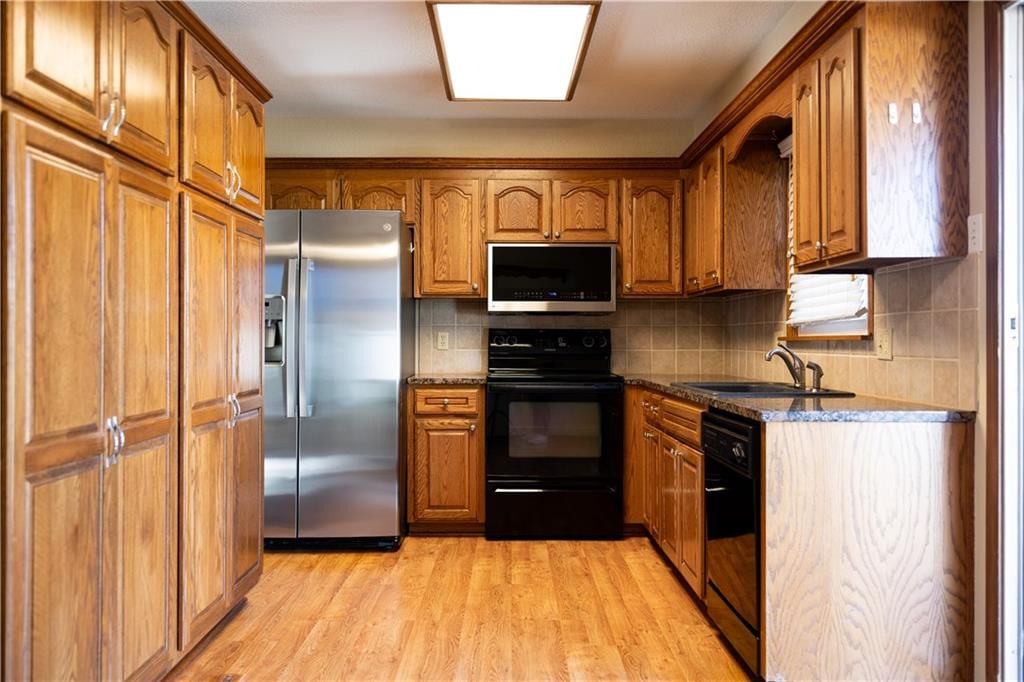 7406 NW Belvidere Parkway — photo 2