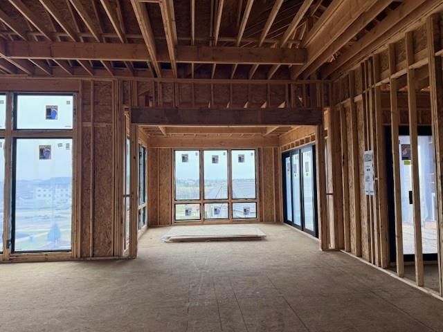 Tall ceilings, floor-to-ceiling windows and wall of windows at 13701 Guilford Road, Leawood, KS 66224