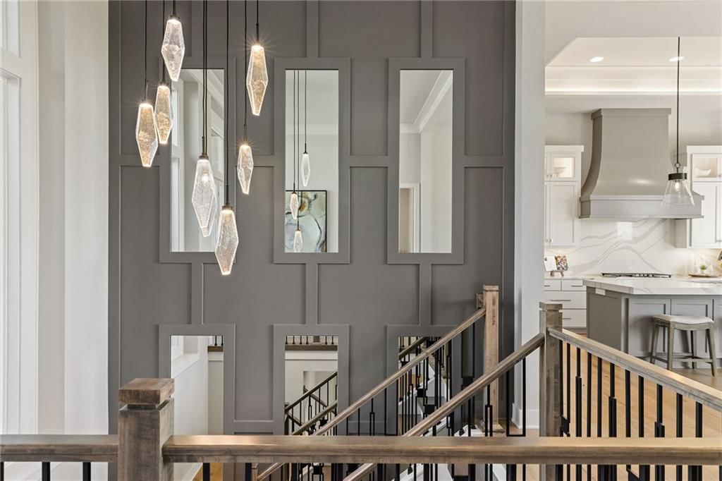 Wood stair railing at 13701 Guilford Road, Leawood, KS 66224