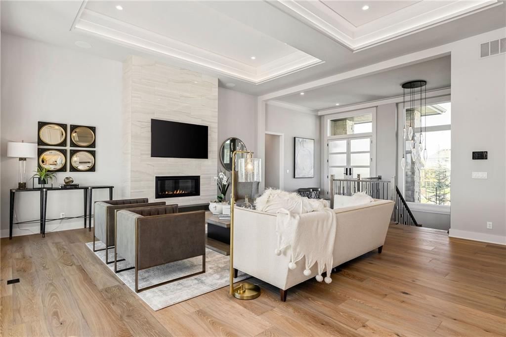 Fireplace, tray ceiling and tile fireplace at 13701 Guilford Road, Leawood, KS 66224