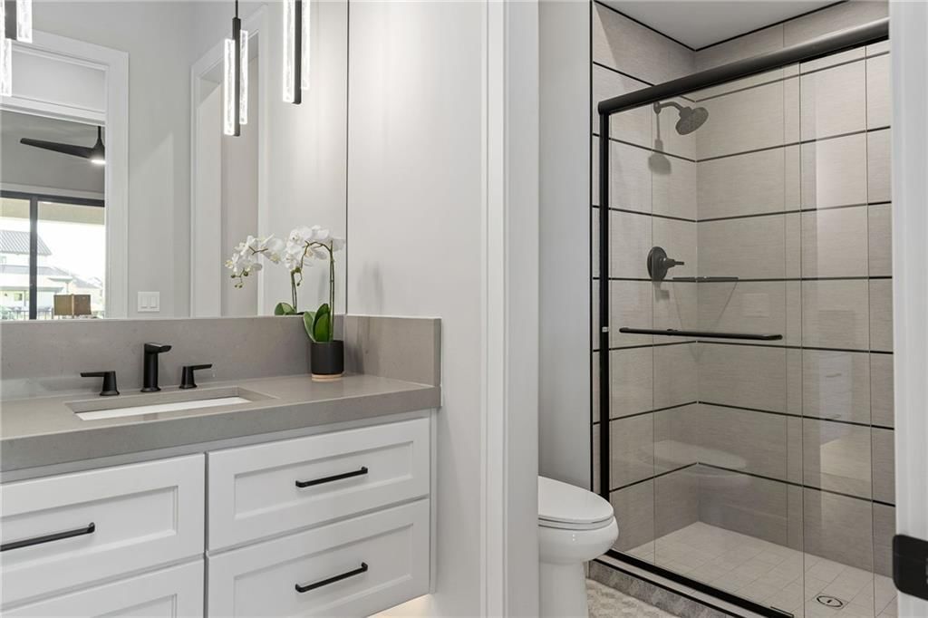 Walk-in shower at 13701 Guilford Road, Leawood, KS 66224
