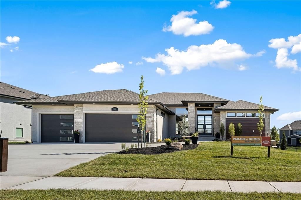 Garage for three or more cars, driveway and concrete driveway at 13701 Guilford Road, Leawood, KS 66224
