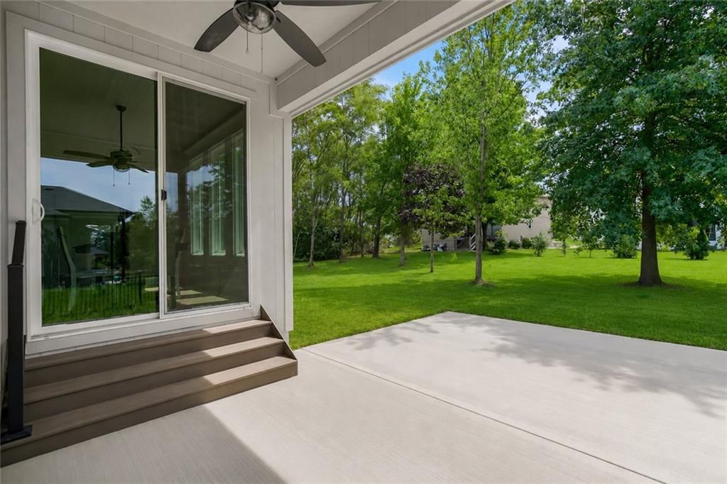 Photo 36 of 37 - 2616 NE Woodland Oak Drive, Lee's Summit, MO 64086