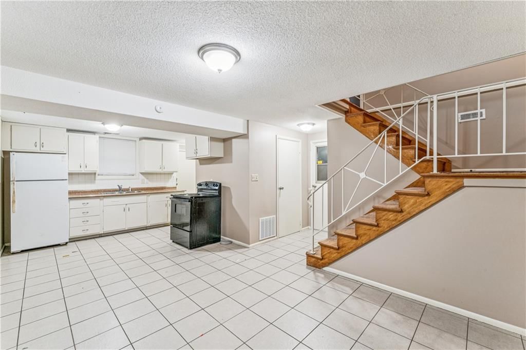 9608 Ditman Way — photo 18