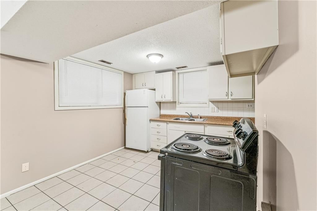 9608 Ditman Way — photo 20