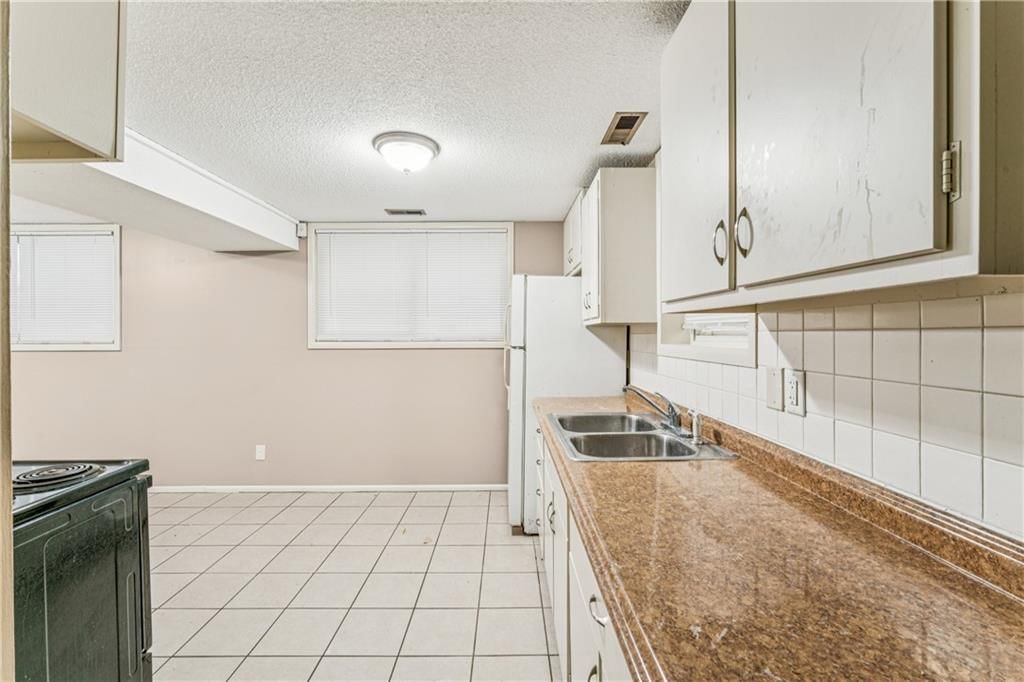 9608 Ditman Way — photo 21