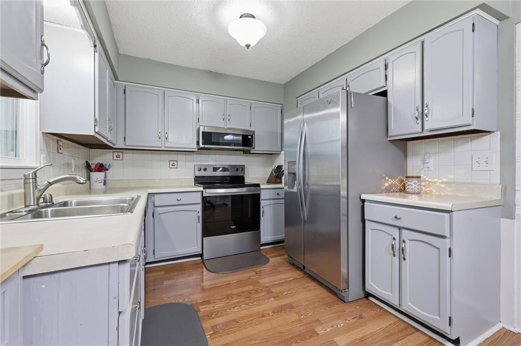 8001 Bel Ray Drive — photo 10