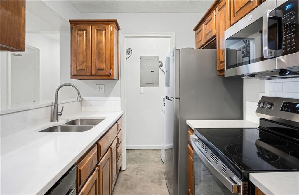 12027 W 58th Place — photo 2
