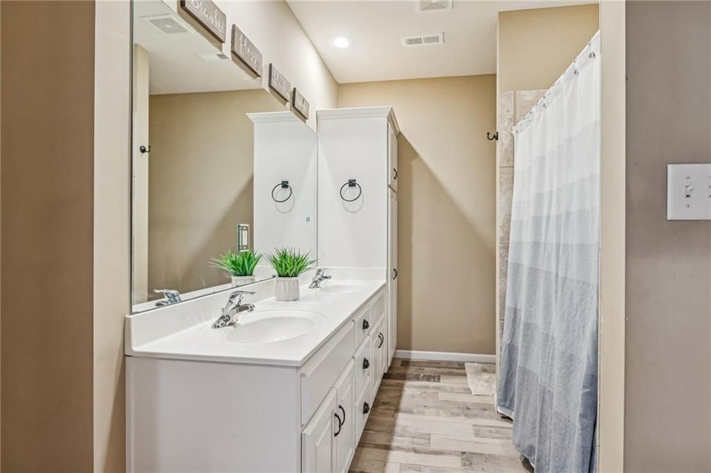 4481 SW Raintree Shore Drive — photo 40