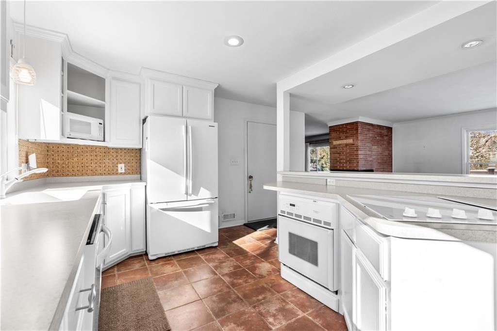 1408 E 108th Terrace — photo 17