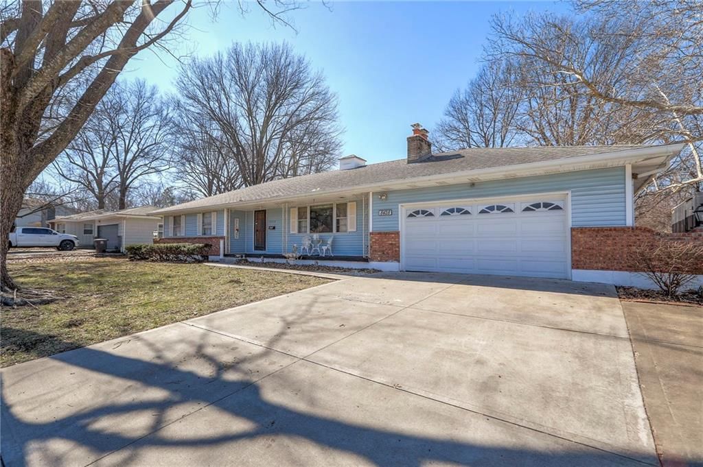 8428 James A Reed Road — photo 2