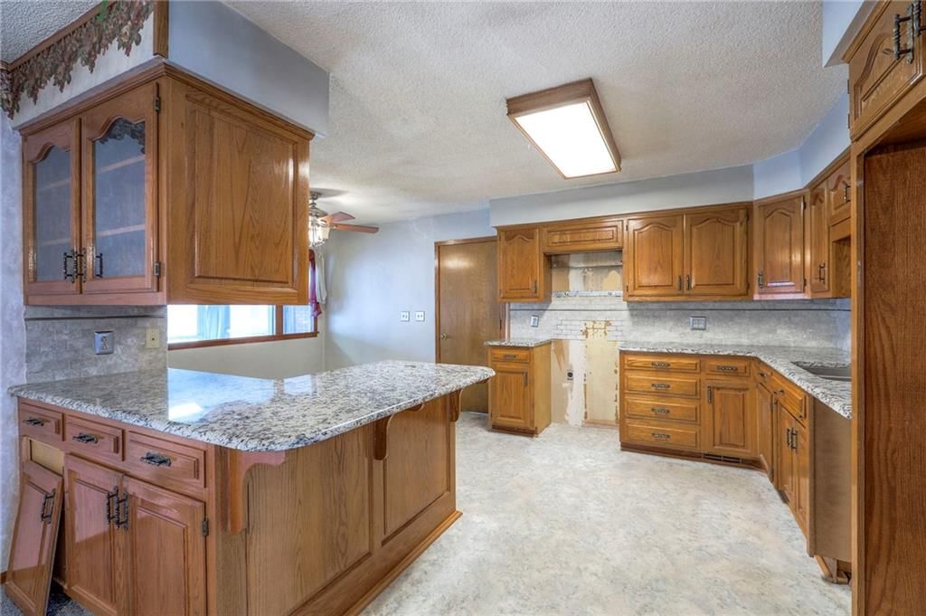 8428 James A Reed Road — photo 16