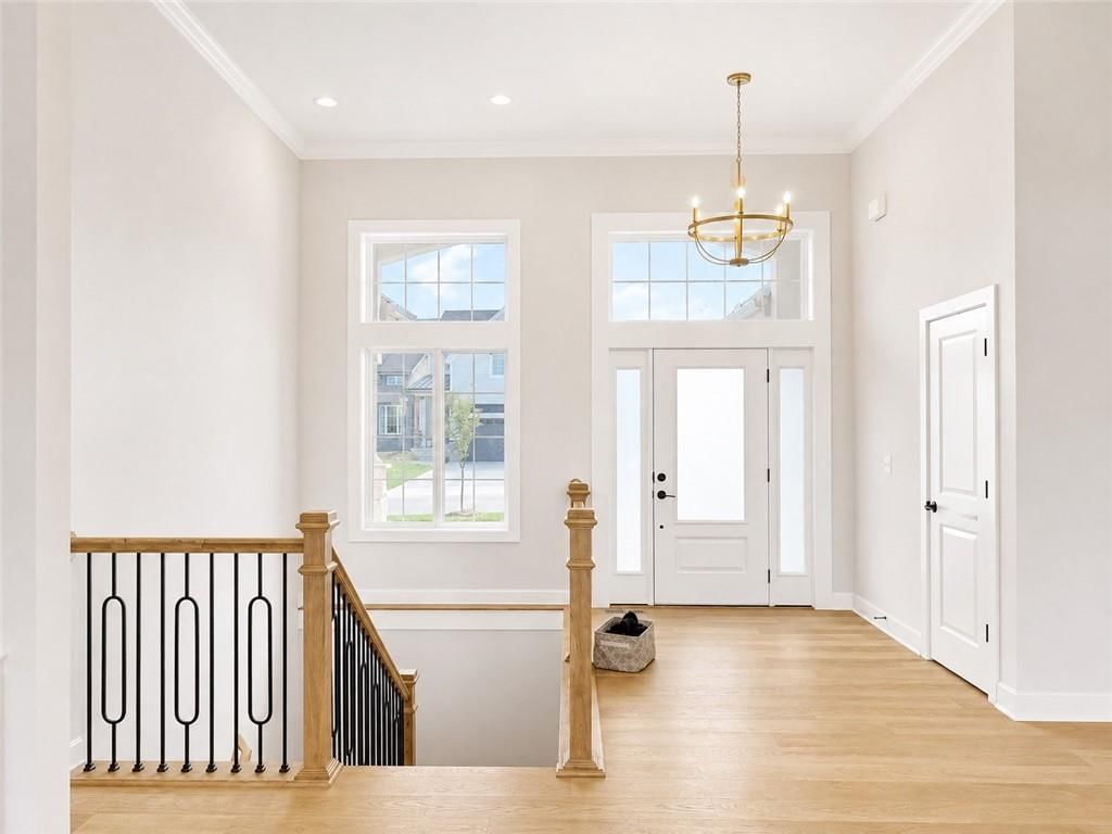 Staircase and iron stair railing at 8004 Round Prairie Street, Shawnee, KS 66220