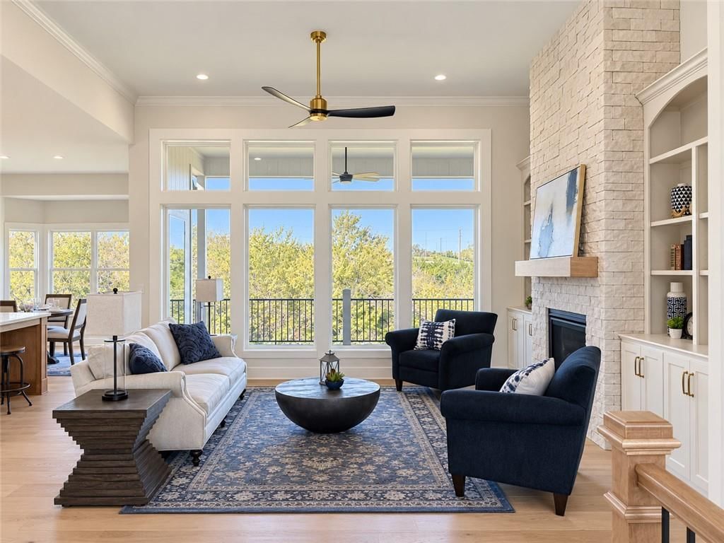 Tall ceilings, open floor plan and hardwood floors at 8004 Round Prairie Street, Shawnee, KS 66220