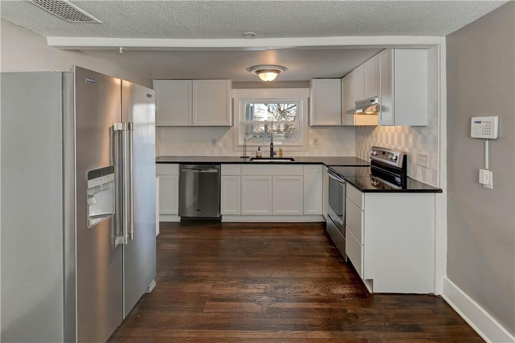 4859 NW Waukomis Drive — photo 2