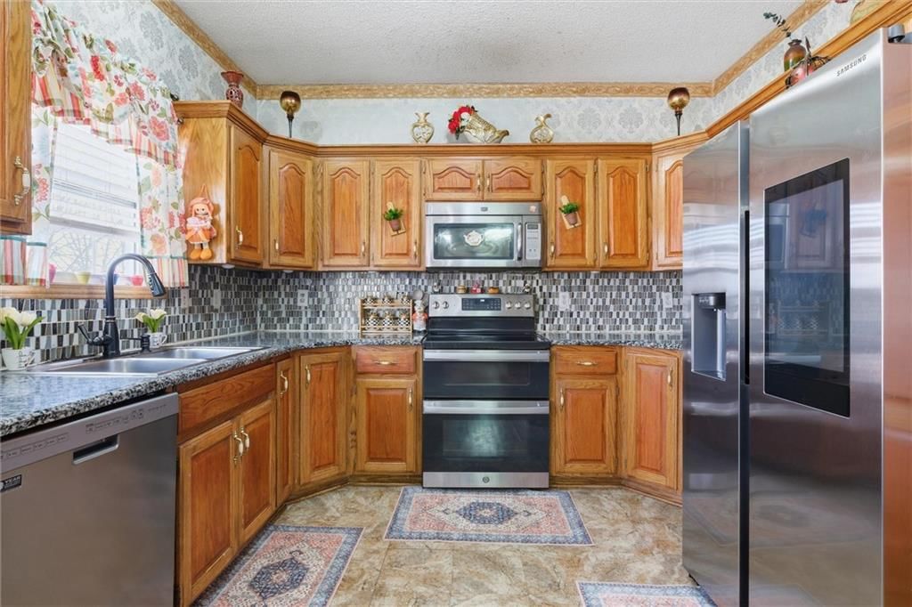 4407 SW Briarbrook Drive — photo 8