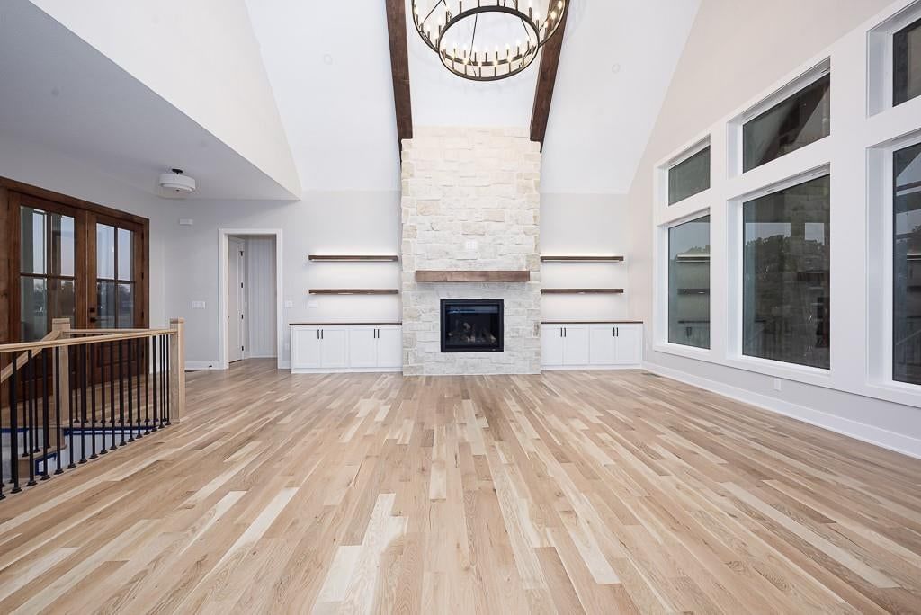 Tall ceilings, fireplace and hardwood floors at 18005 235th Street, Tonganoxie, KS 66086