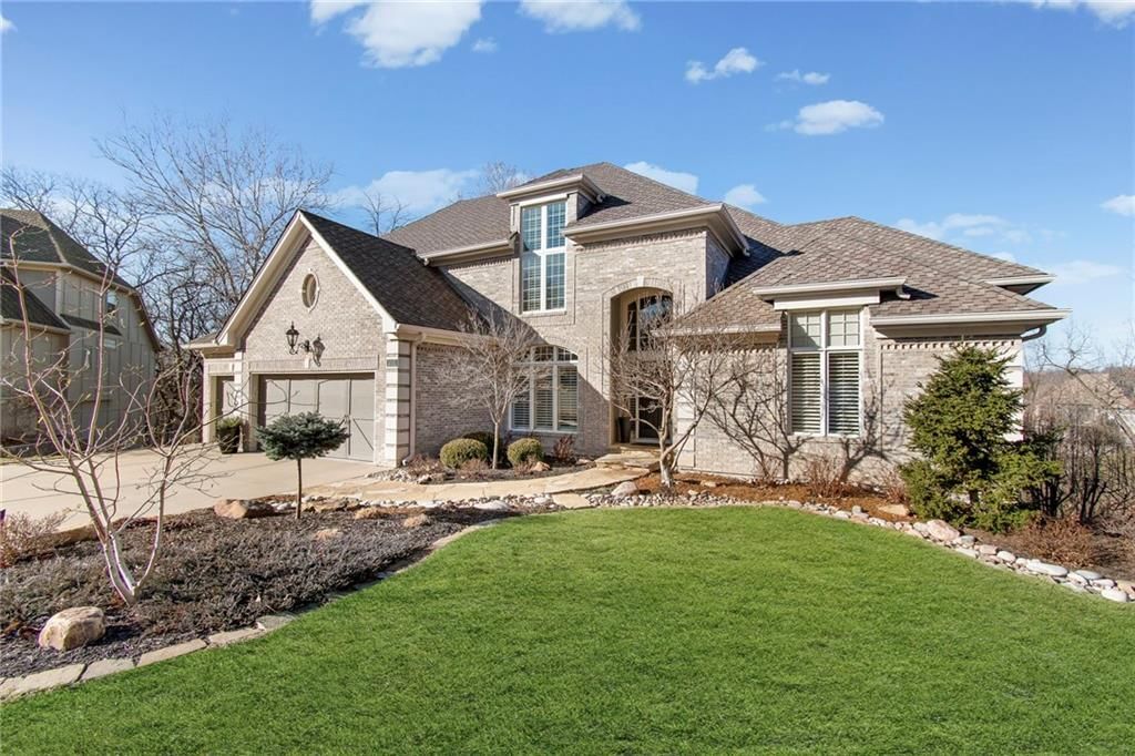 5757 NW HICKORY Court — photo 2
