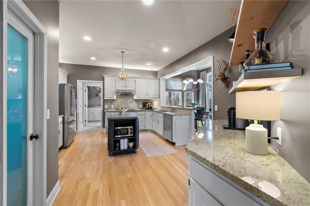5757 NW HICKORY Court — photo 12