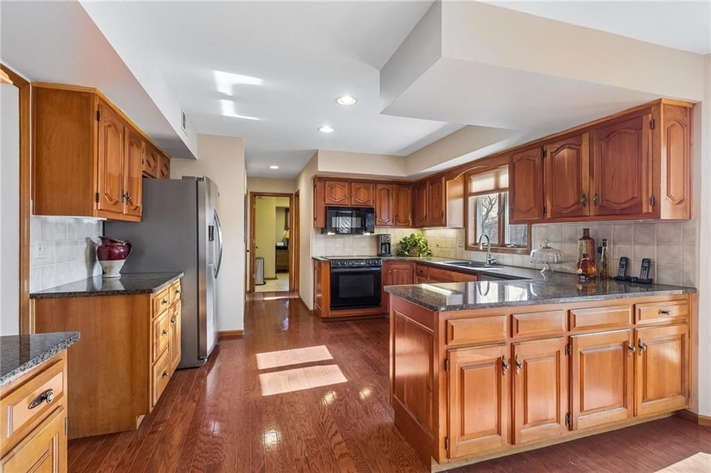 4433 NW Claymont Woods Drive — photo 7