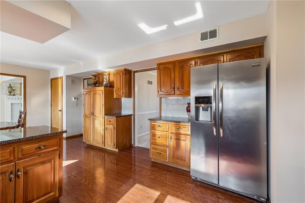 4433 NW Claymont Woods Drive — photo 9