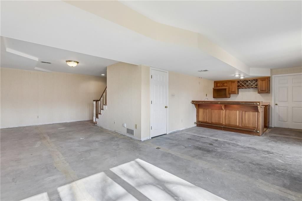 4433 NW Claymont Woods Drive — photo 35
