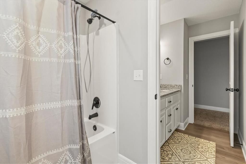801 NW Hickory Ridge Drive — photo 18