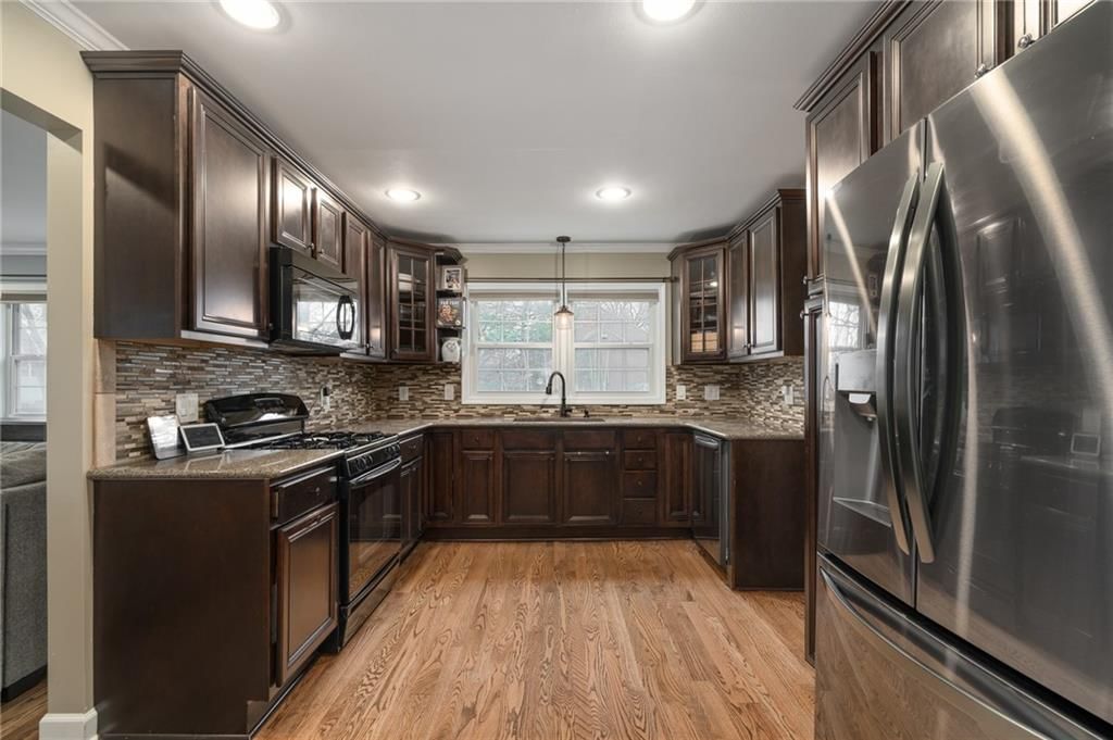 9501 Riggs Street — photo 4